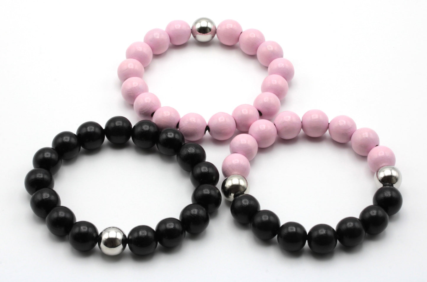 Pink&Black puuhelmi rannekorut